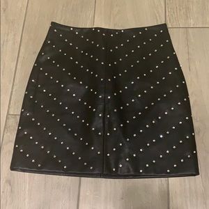 Leather and crystal mini skirt